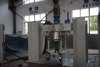Mélangeur de récipient de poudre électrostatique continu en spirale
